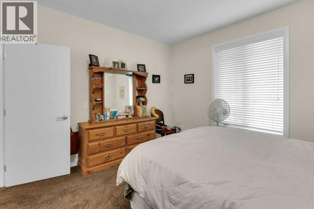 2104, 15 Sunset Square, Cochrane, Alberta  T4C 0E7 - Photo 23 - A2299363