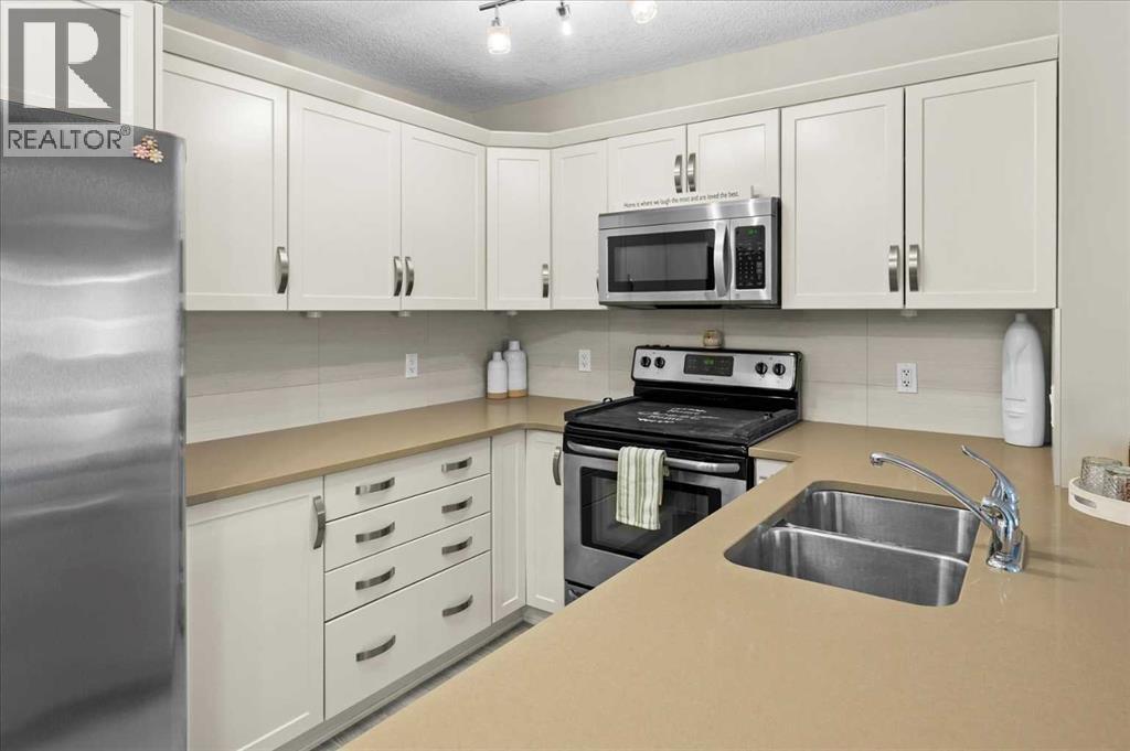 2203, 175 Panatella Hill Nw, Calgary, Alberta  T3K 0V9 - Photo 6 - A2307225