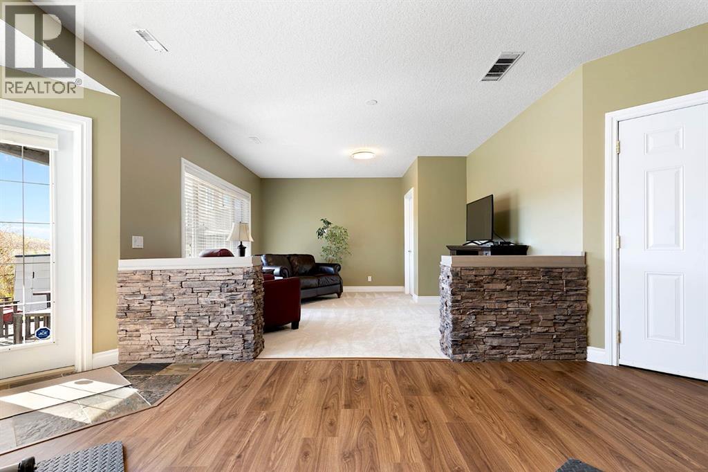 127 Gleneagles Terrace, Cochrane, Alberta  T4C 1W6 - Photo 38 - A2310227