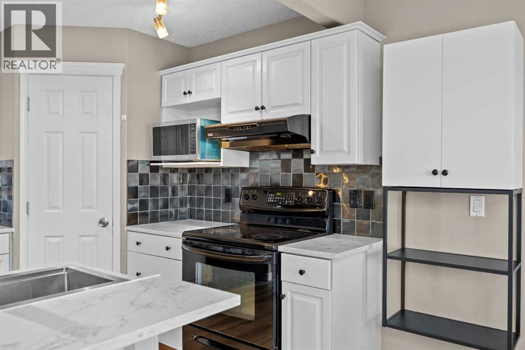 170 Hidden Hills Terrace Nw, Calgary, Alberta  T3A 6E3 - Photo 9 - A2308710