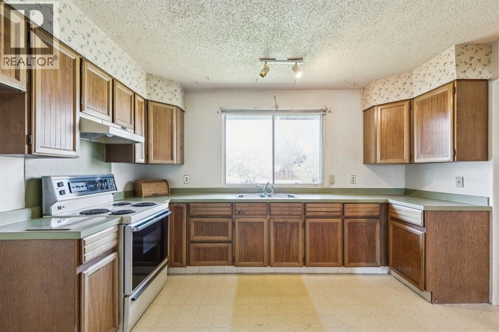 1132 Hunterston Hill Nw, Calgary, Alberta  T2K 4N8 - Photo 15 - A2310573