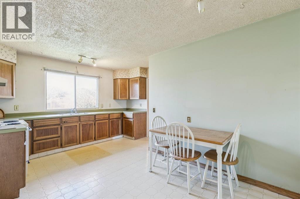 1132 Hunterston Hill Nw, Calgary, Alberta  T2K 4N8 - Photo 14 - A2310573