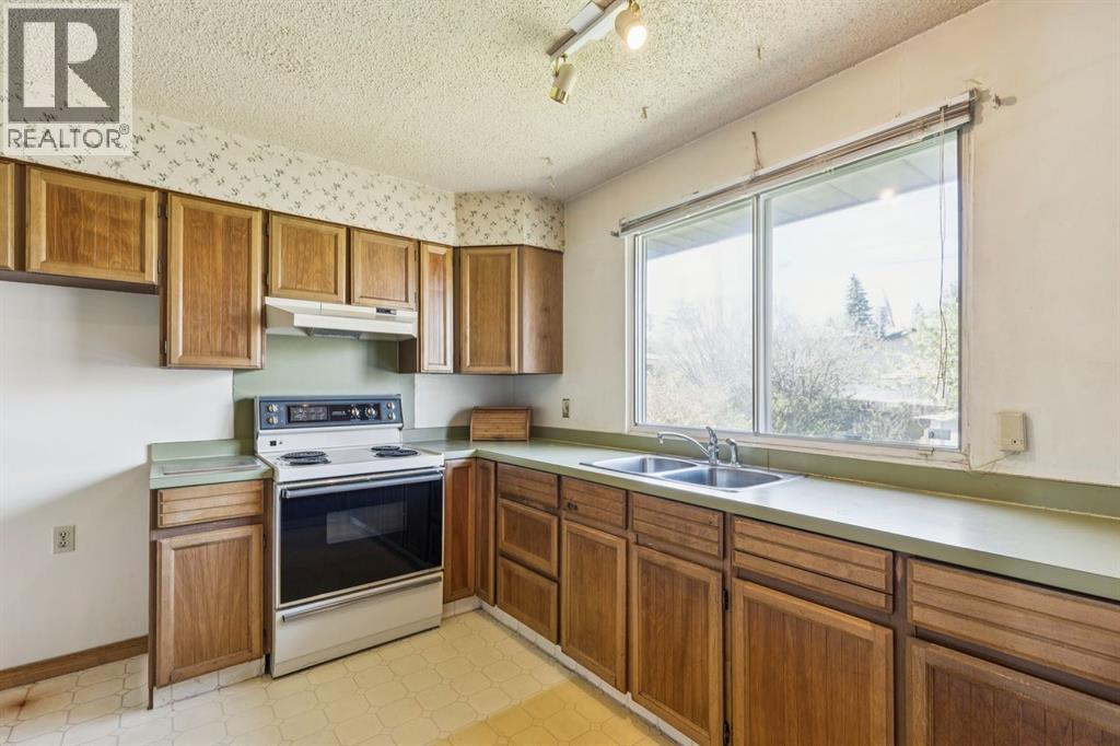 1132 Hunterston Hill Nw, Calgary, Alberta  T2K 4N8 - Photo 16 - A2310573