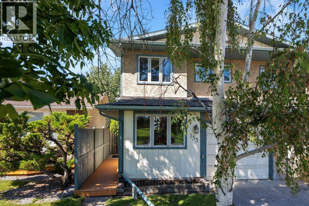 153 Mckinnon Crescent Ne, Calgary, Alberta  T2E 7B6 - Photo 4 - A2299949