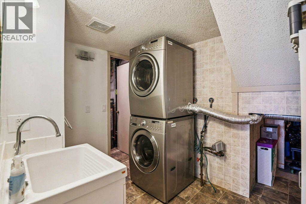 153 Mckinnon Crescent Ne, Calgary, Alberta  T2E 7B6 - Photo 25 - A2299949
