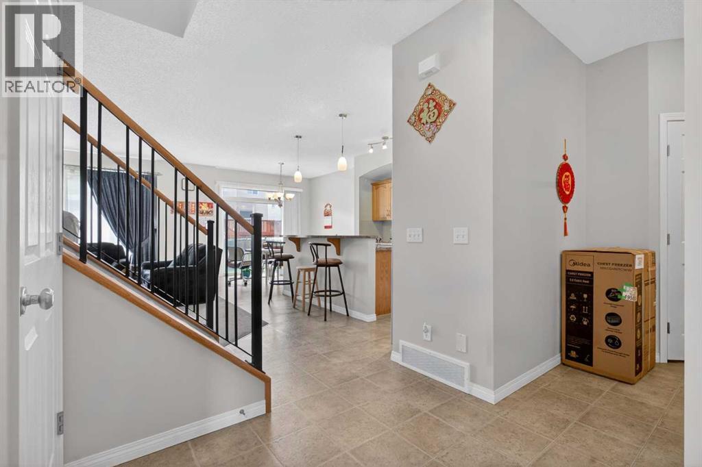 156 Saddlecrest Park Ne, Calgary, Alberta  T3J 5L5 - Photo 5 - A2310676
