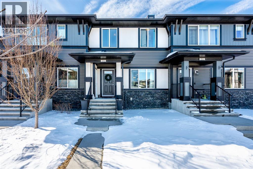 23 Belgian Link, Cochrane, Alberta  T4C 0M3 - Photo 1 - A2303290