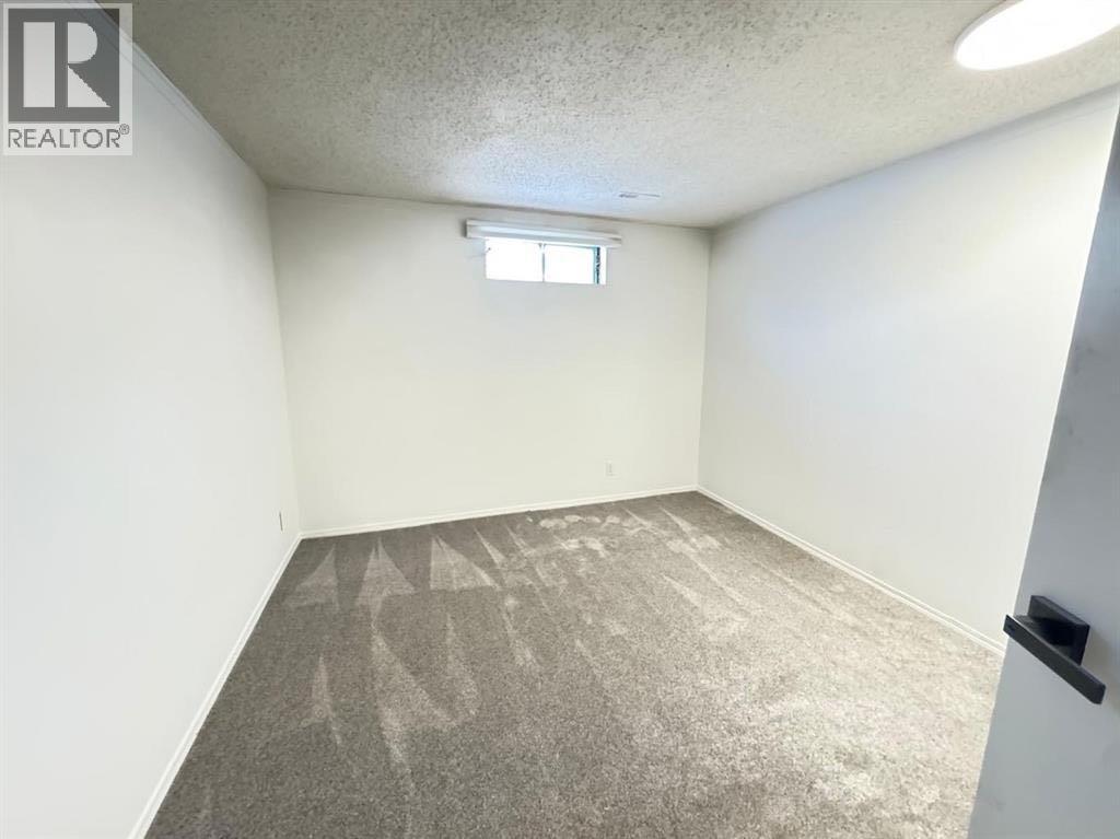 6879 Rundlehorn Drive NE, Calgary, Alberta  T1Y 4P2 - Photo 14 - A2293760