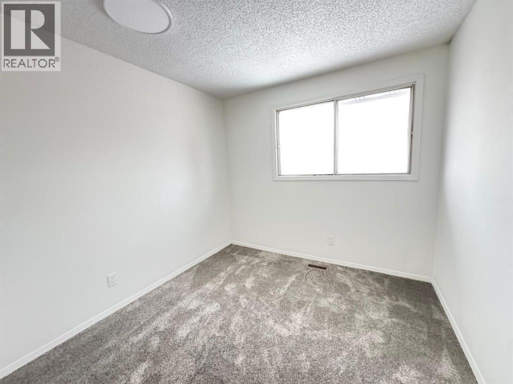 6879 Rundlehorn Drive NE, Calgary, Alberta  T1Y 4P2 - Photo 6 - A2293760