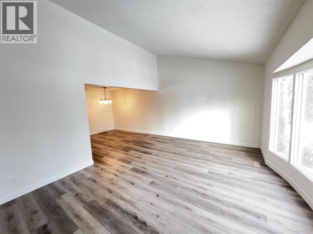 6879 Rundlehorn Drive NE, Calgary, Alberta  T1Y 4P2 - Photo 2 - A2293760
