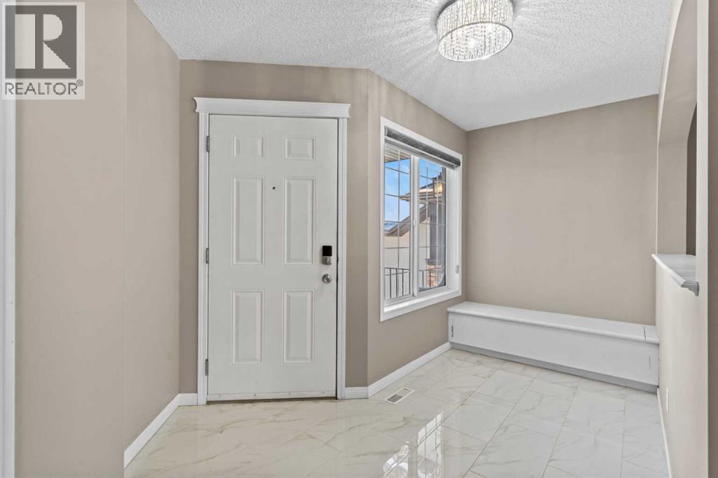 138 Saddlecrest Park NE, Calgary, Alberta  T3J 5L5 - Photo 4 - A2290020
