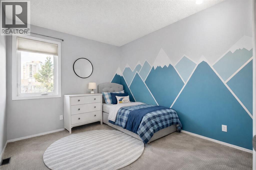 103 Coachway Lane Sw, Calgary, Alberta  T3H 2V9 - Photo 13 - A2290563