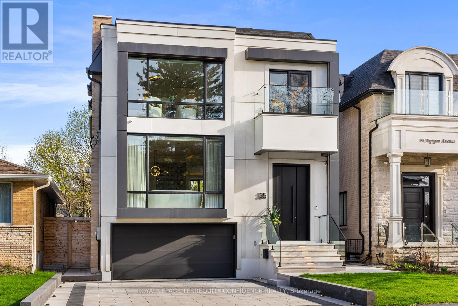<div class="slider-price">$2,888,000</div><p>35 Nipigon Avenue, Toronto, Ontario</p>