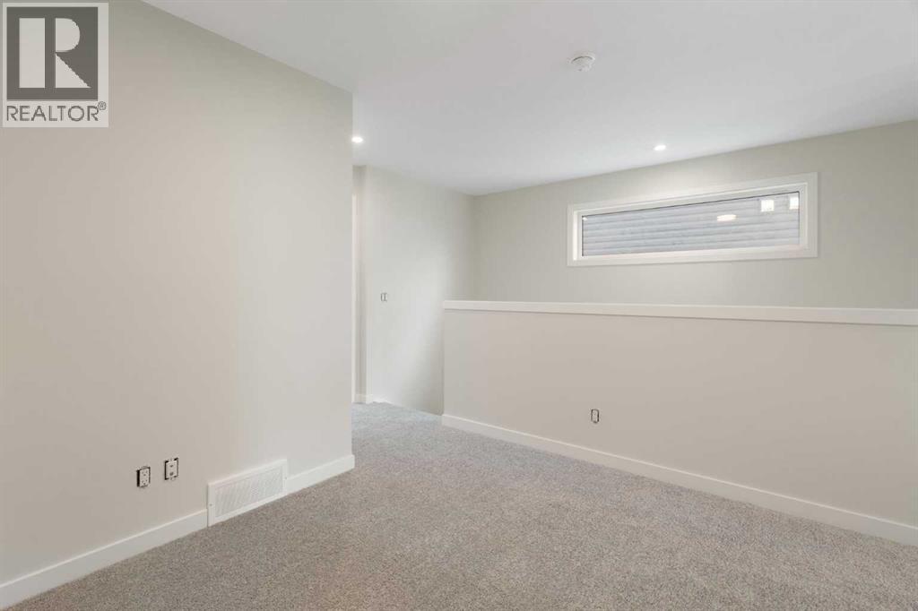 1457 Rangeview Drive SE, Calgary, Alberta  T3S 0P8 - Photo 31 - A2307401
