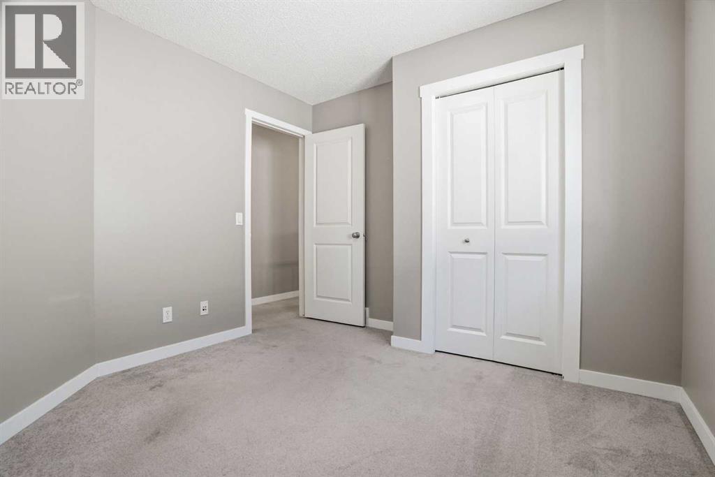 202 New Brighton Manor SE, Calgary, Alberta  T2Z 4J4 - Photo 23 - A2306864