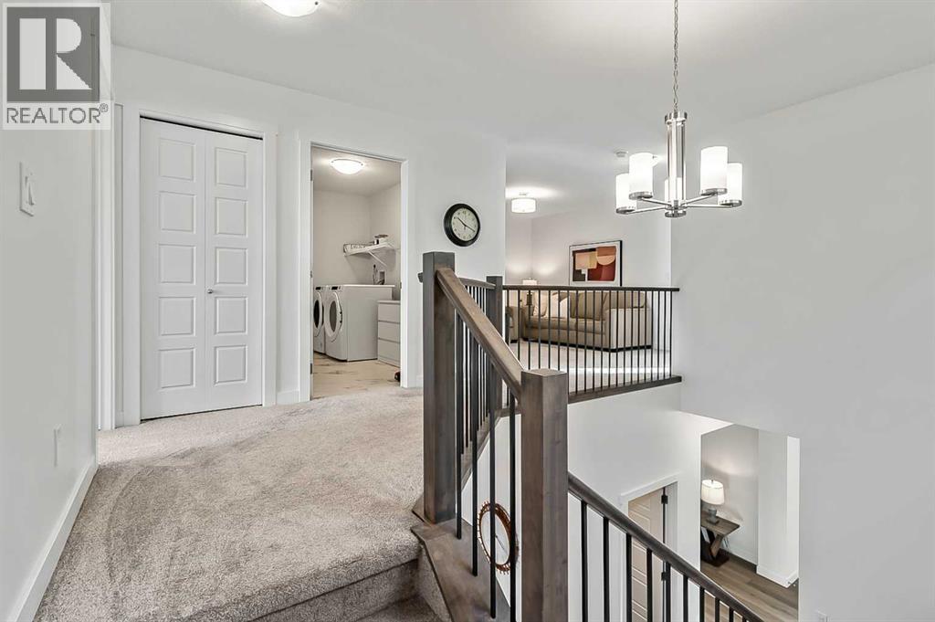 882 Bluerock Way SW, Calgary, Alberta  T2Y 0S5 - Photo 19 - A2293006