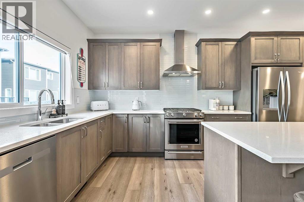882 Bluerock Way SW, Calgary, Alberta  T2Y 0S5 - Photo 9 - A2293006