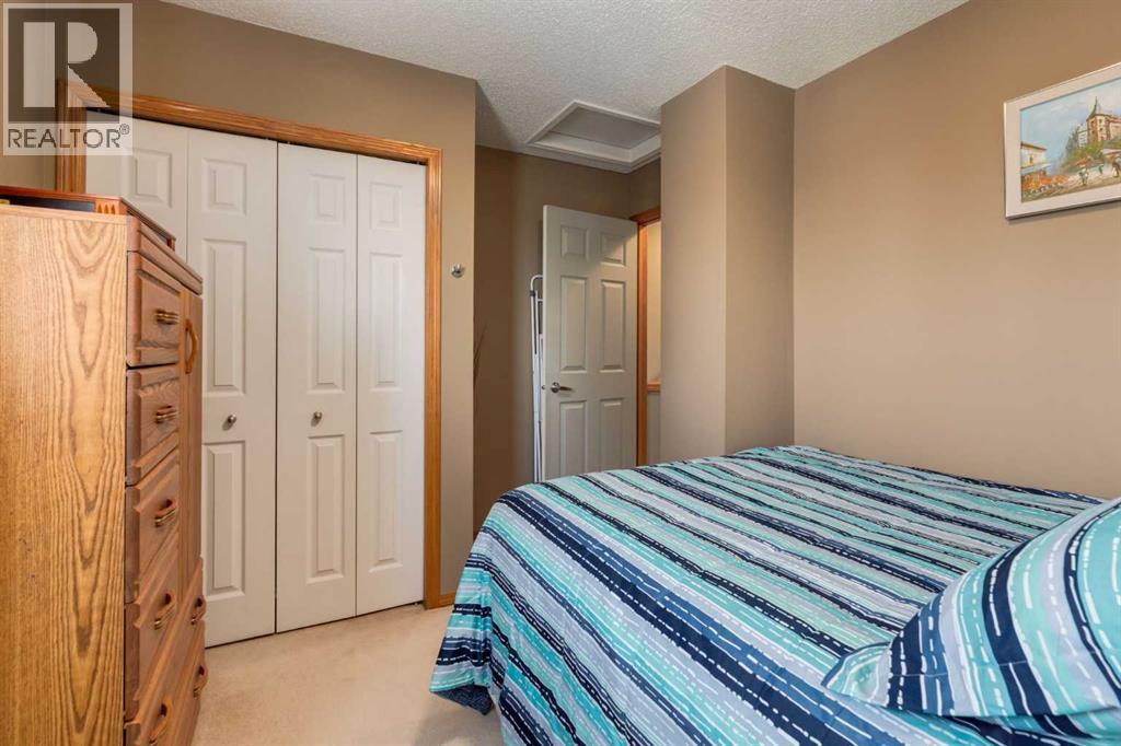 159 Macewan Drive Nw, Calgary, Alberta  T3K 3G5 - Photo 28 - A2309354