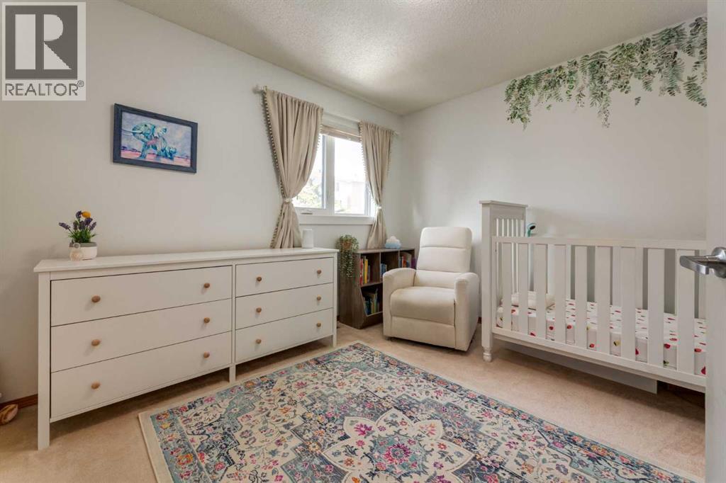 159 Macewan Drive Nw, Calgary, Alberta  T3K 3G5 - Photo 24 - A2309354