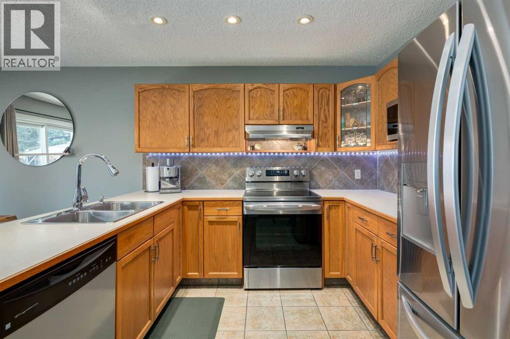 159 Macewan Drive Nw, Calgary, Alberta  T3K 3G5 - Photo 7 - A2309354