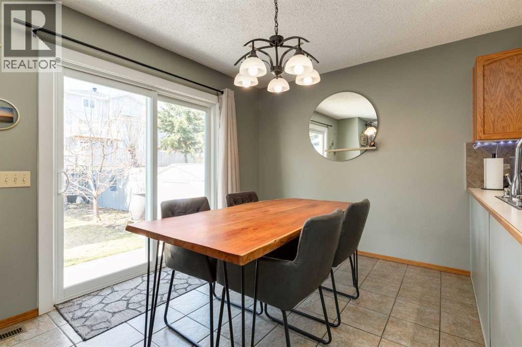 159 Macewan Drive Nw, Calgary, Alberta  T3K 3G5 - Photo 11 - A2309354