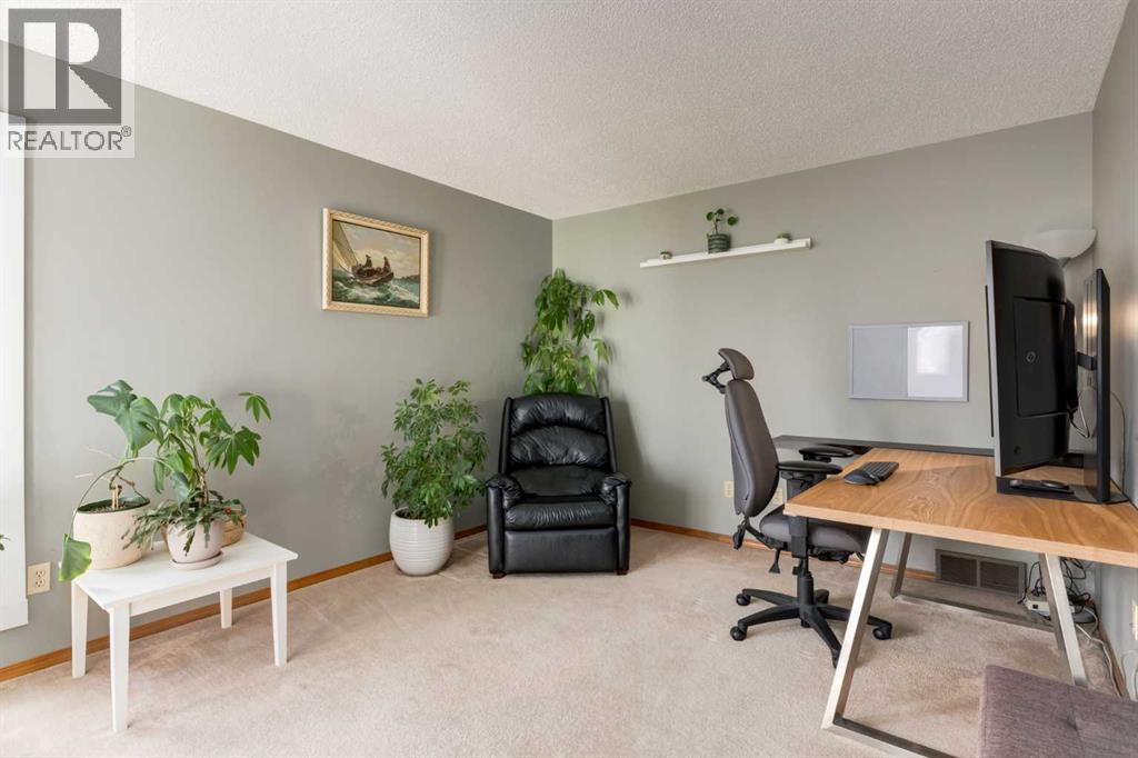 159 Macewan Drive Nw, Calgary, Alberta  T3K 3G5 - Photo 4 - A2309354