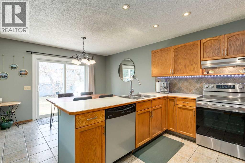159 Macewan Drive Nw, Calgary, Alberta  T3K 3G5 - Photo 8 - A2309354