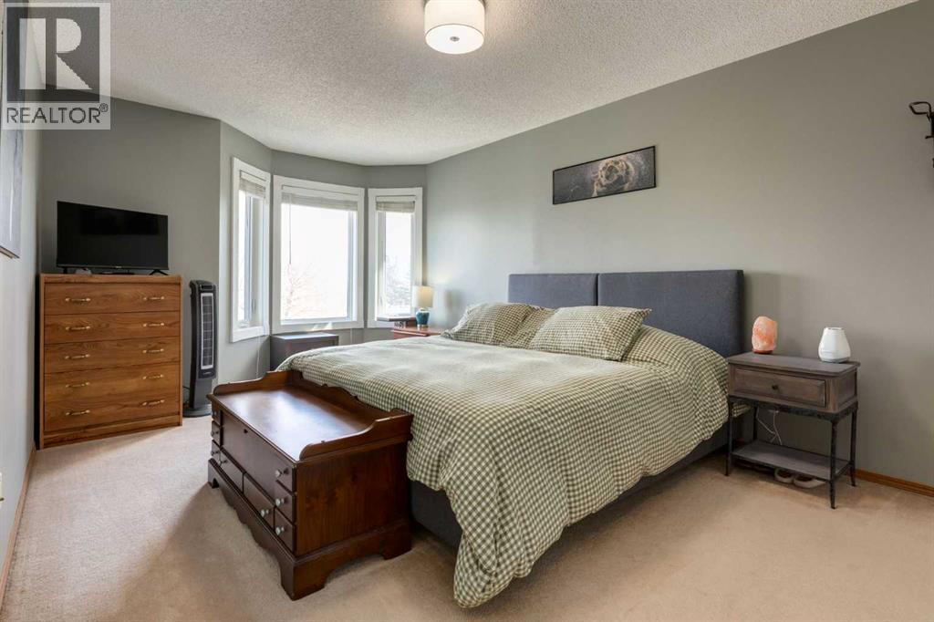 159 Macewan Drive Nw, Calgary, Alberta  T3K 3G5 - Photo 19 - A2309354