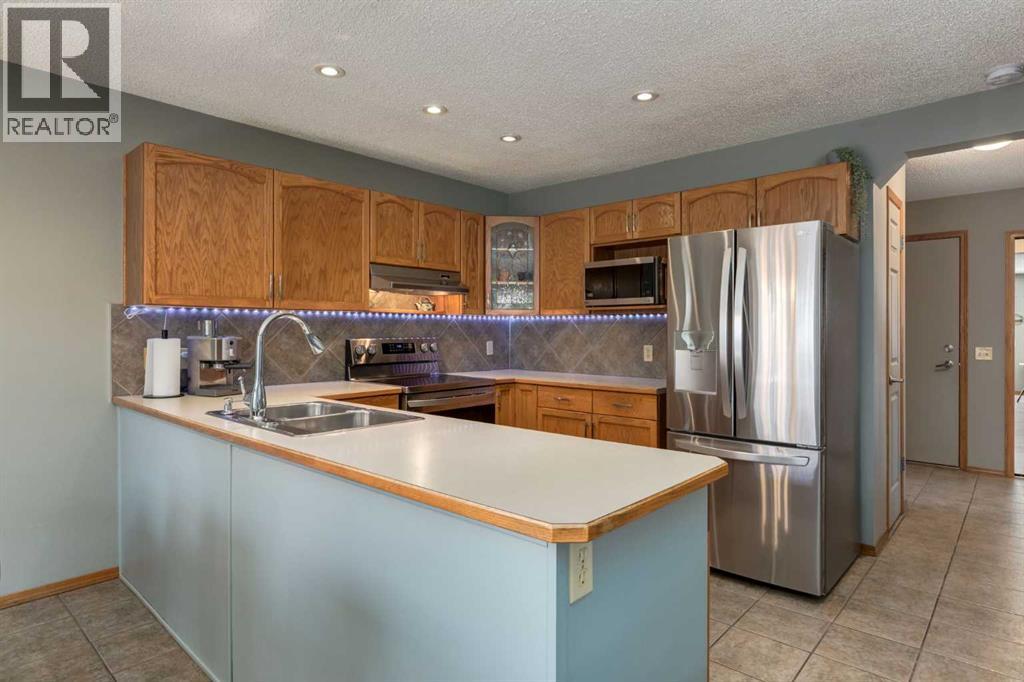 159 Macewan Drive Nw, Calgary, Alberta  T3K 3G5 - Photo 6 - A2309354