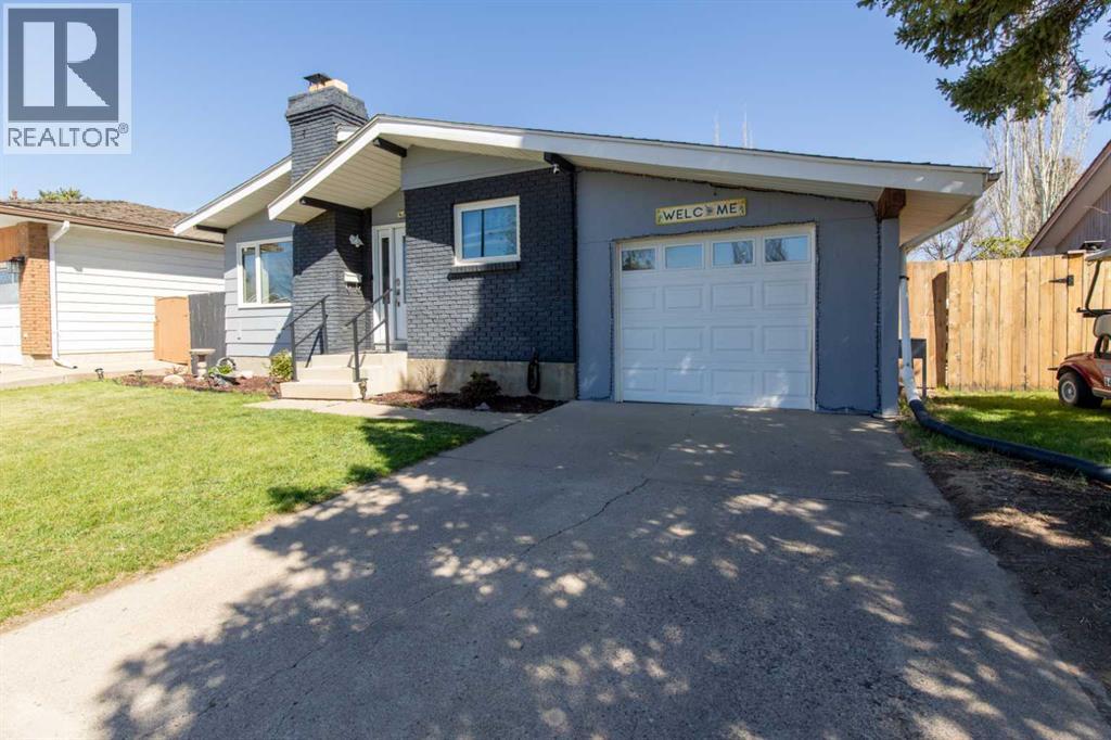 1047 Lakemount Boulevard S, Lethbridge, Alberta  T1K 3S6 - Photo 3 - A2308147
