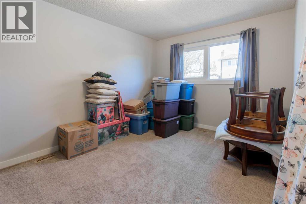 1047 Lakemount Boulevard S, Lethbridge, Alberta  T1K 3S6 - Photo 22 - A2308147