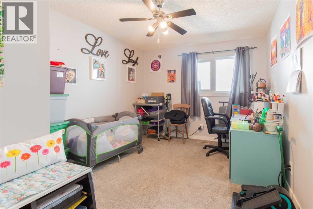 1047 Lakemount Boulevard S, Lethbridge, Alberta  T1K 3S6 - Photo 18 - A2308147