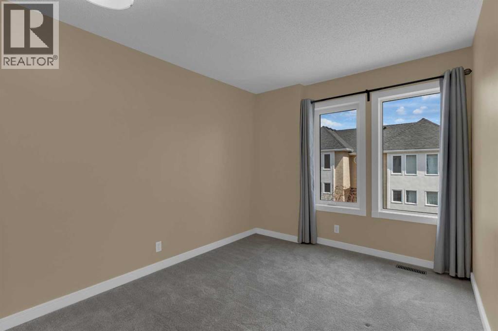 87 Candle Terrace SW, Calgary, Alberta  T2W 6G7 - Photo 21 - A2297042