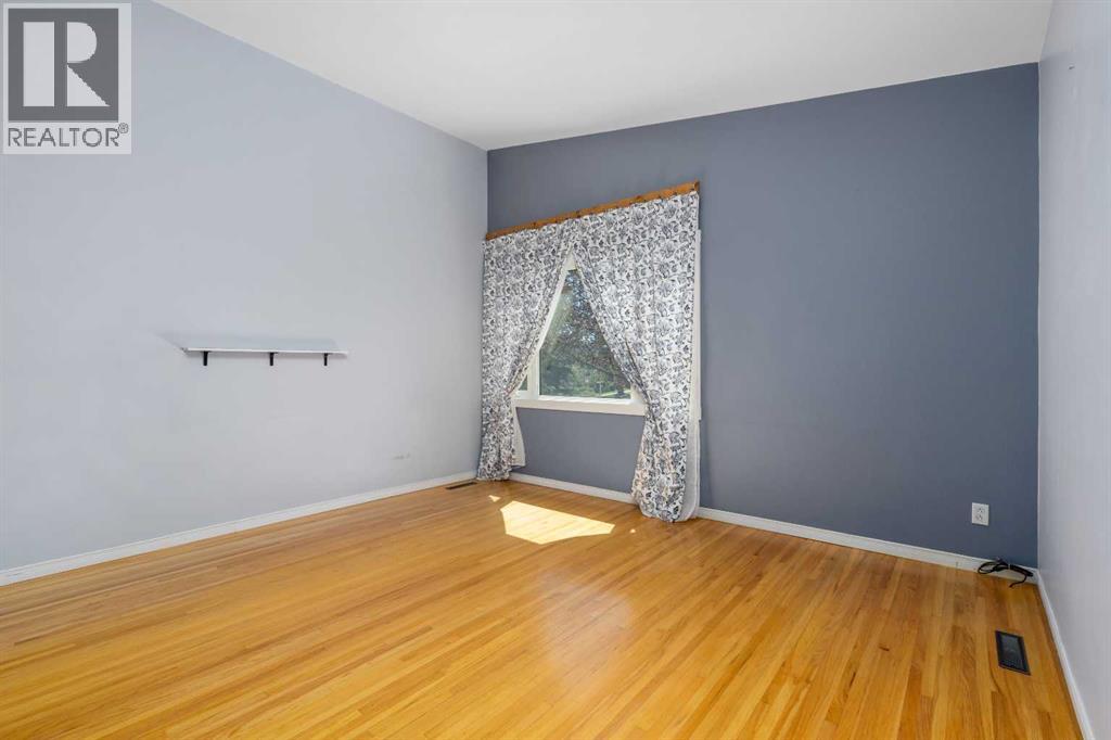 630 69 Avenue SW, Calgary, Alberta  T2V 0N9 - Photo 3 - A2311100
