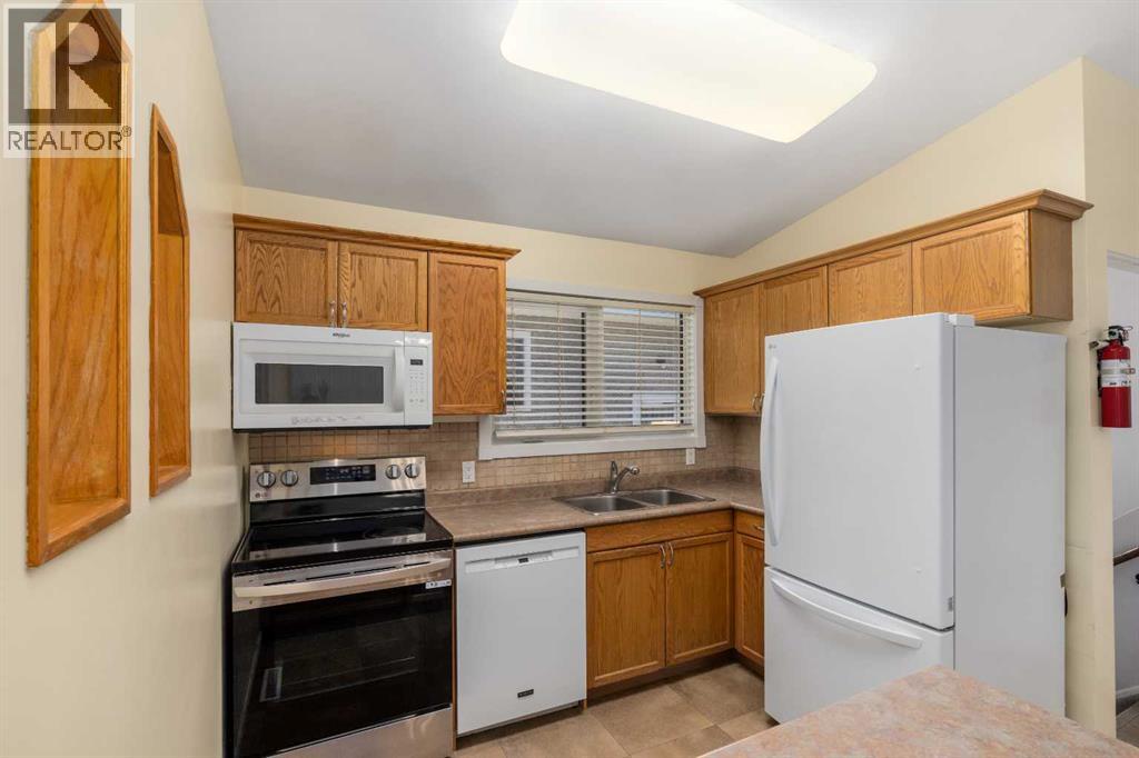 630 69 Avenue SW, Calgary, Alberta  T2V 0N9 - Photo 5 - A2311100