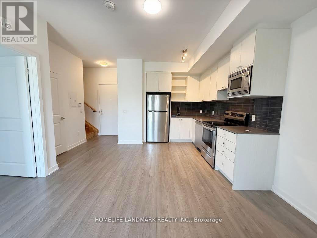 214 - 155 Downsview Park Boulevard, Toronto, Ontario  M3K 0E3 - Photo 3 - W13127826