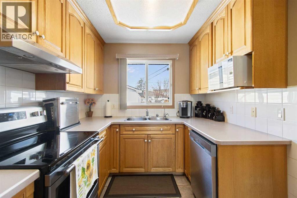 1108 Marcombe Crescent Ne, Calgary, Alberta  T2A 4H7 - Photo 3 - A2303472