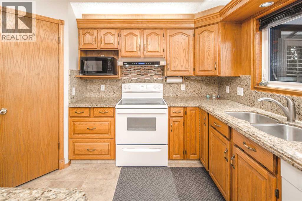 37 Arbour Summit Close NW, Calgary, Alberta  T3G 3W1 - Photo 10 - A2310638