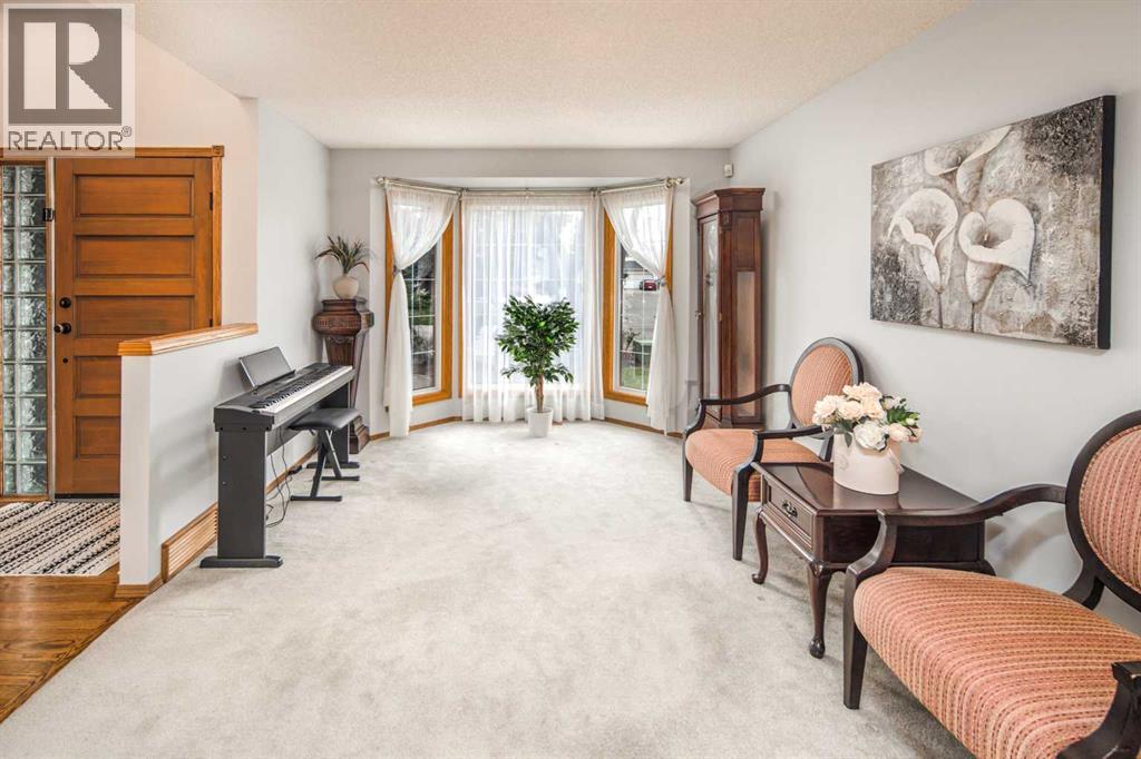 37 Arbour Summit Close NW, Calgary, Alberta  T3G 3W1 - Photo 3 - A2310638