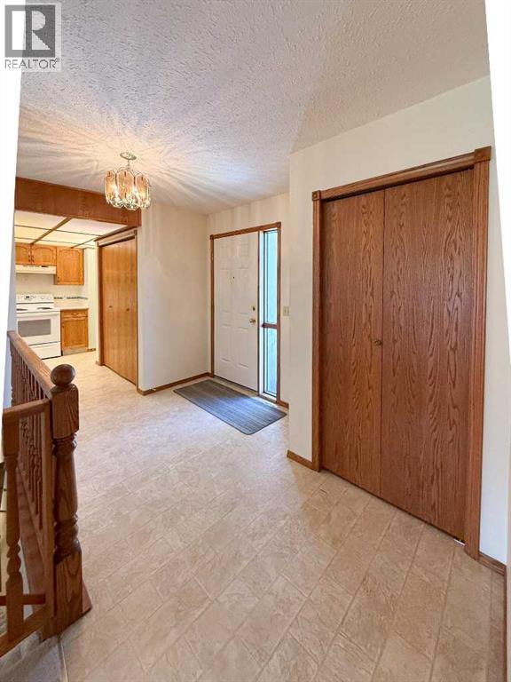 4117 Silverpark Estates Close, Olds, Alberta  T4H 1B4 - Photo 4 - A2309442