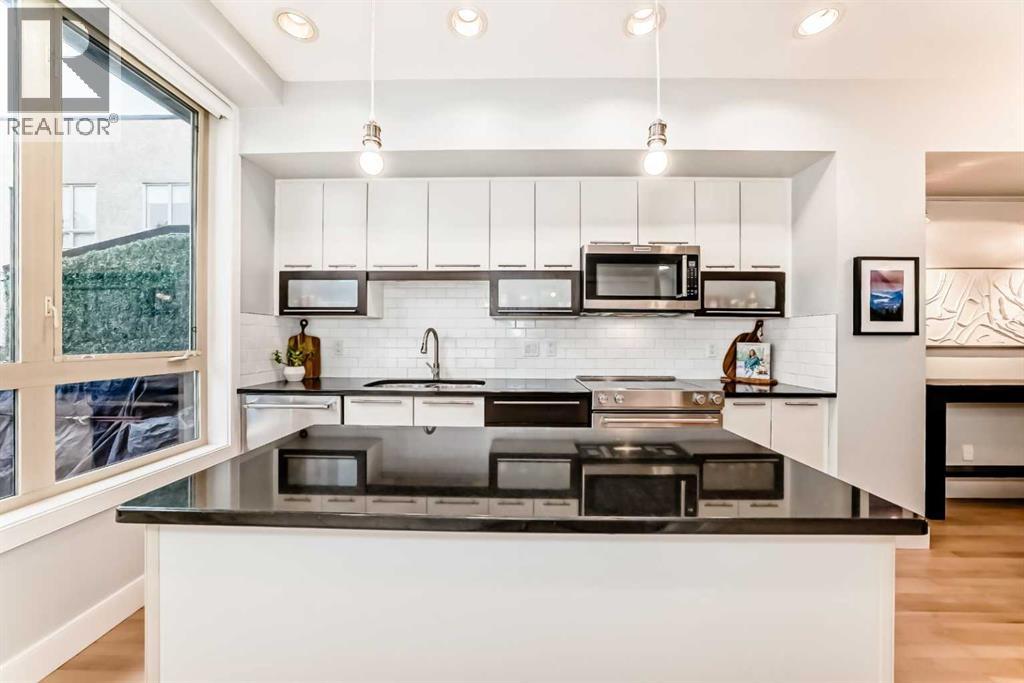 1606 36 Avenue SW, Calgary, Alberta  T2T 6P7 - Photo 11 - A2303544