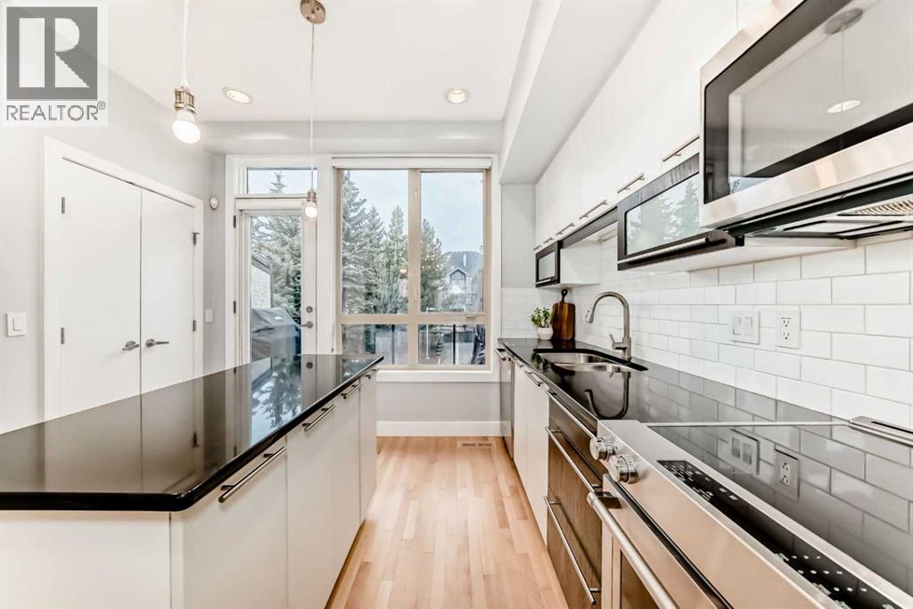 1606 36 Avenue SW, Calgary, Alberta  T2T 6P7 - Photo 6 - A2303544
