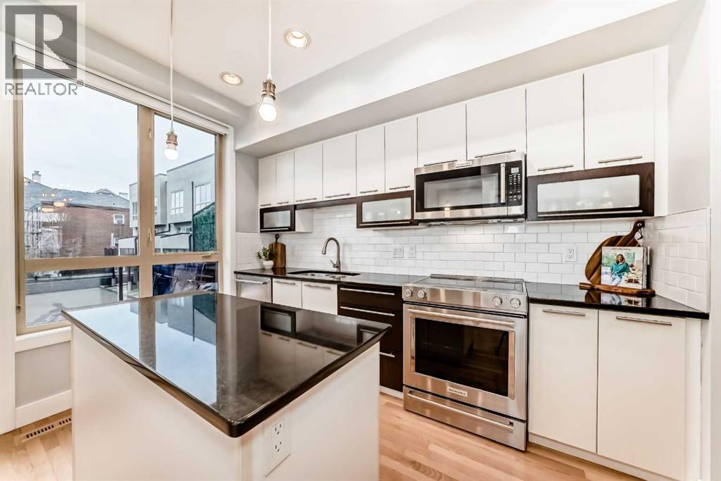 1606 36 Avenue SW, Calgary, Alberta  T2T 6P7 - Photo 5 - A2303544