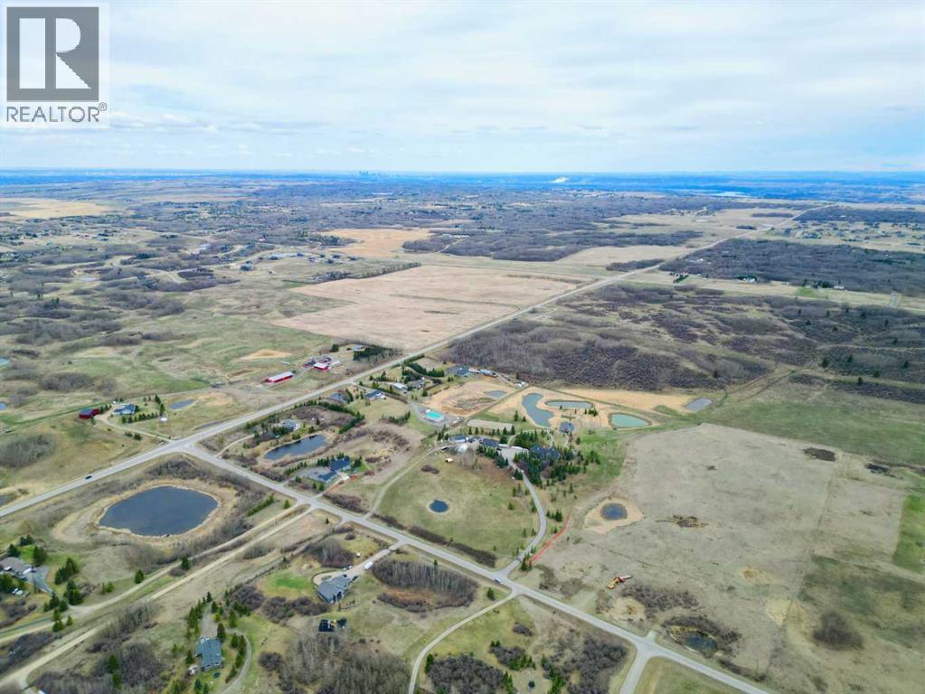 32079 Willow Way, Rural Rocky View County, Alberta  T4C 2Y4 - Photo 7 - A2297217