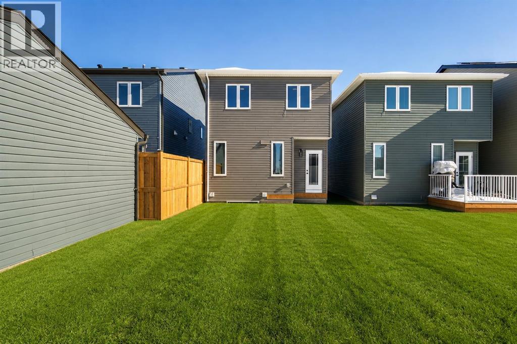 65 Amblefield Heights NW, Calgary, Alberta  T3P 2K1 - Photo 4 - A2301798