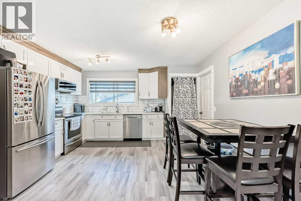 447 Malvern Close Ne, Calgary, Alberta  T2A 4W6 - Photo 5 - A2310514