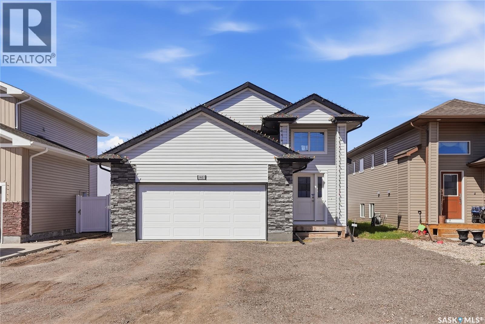 1407 Hughes Drive, Saskatoon, Saskatchewan  S7L 7N2 - Photo 1 - SK035908