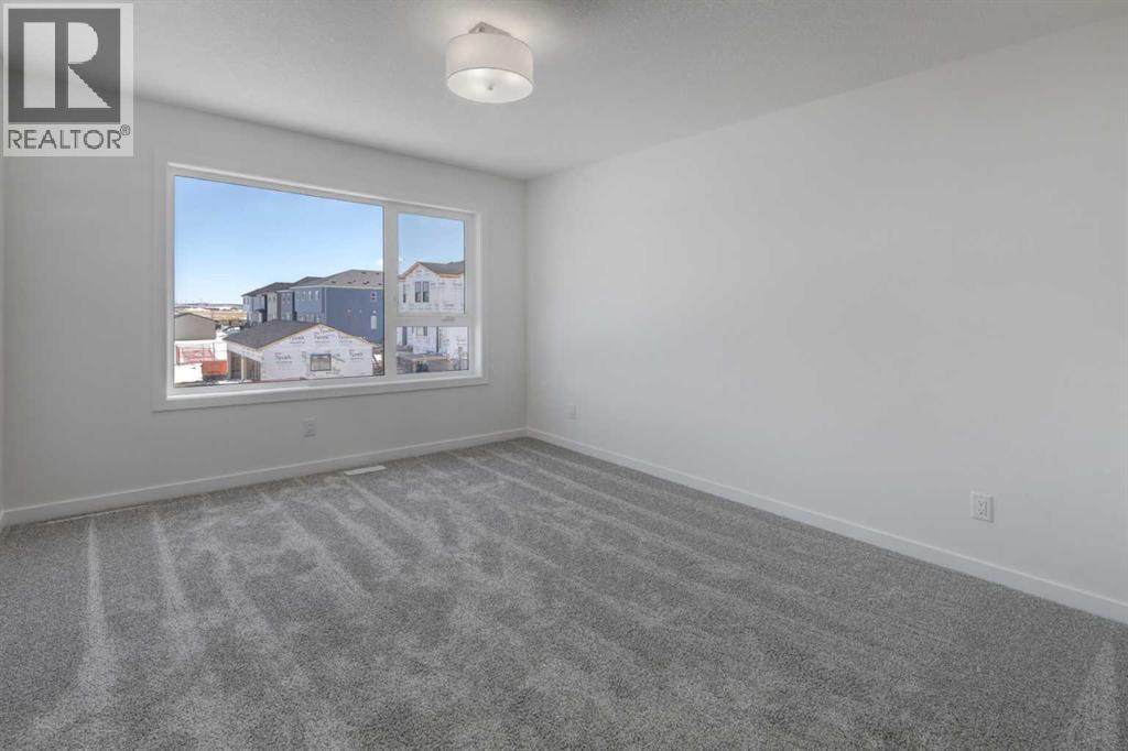 47 Lewisburg Manor Ne, Calgary, Alberta  T3P 2N7 - Photo 13 - A2301813