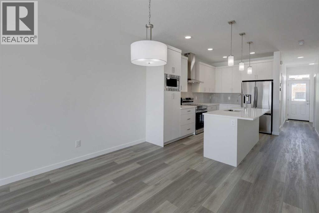 47 Lewisburg Manor Ne, Calgary, Alberta  T3P 2N7 - Photo 6 - A2301813