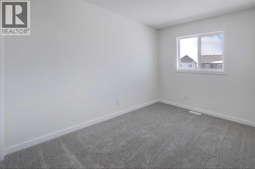 47 Lewisburg Manor Ne, Calgary, Alberta  T3P 2N7 - Photo 18 - A2301813